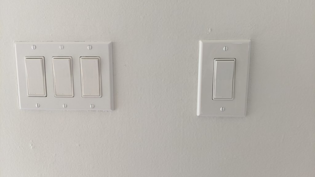 Electrical light switches and plates installed (living room)