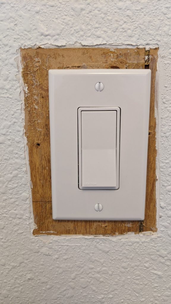 Guest bathroom light switch installed
