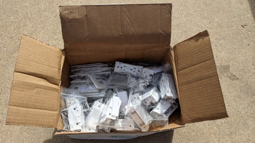 Box of mobile home electrical outlets, switches and wall plates
