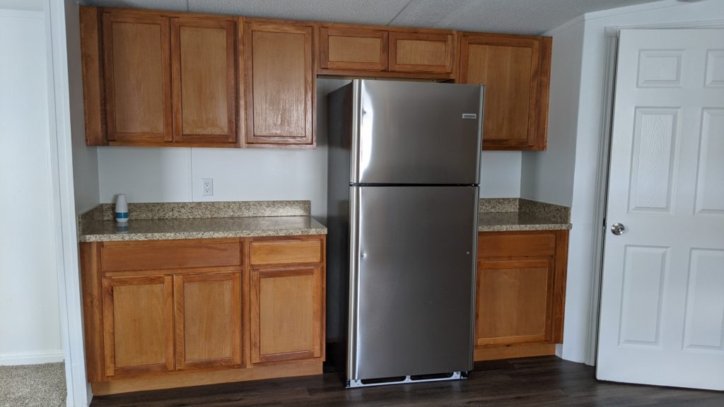 Kitchen cabinets and refrigerator